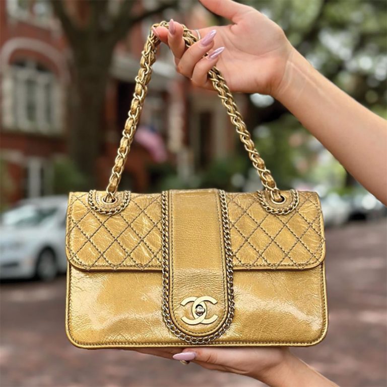 Gold leather Chanel bag with gold chain handles