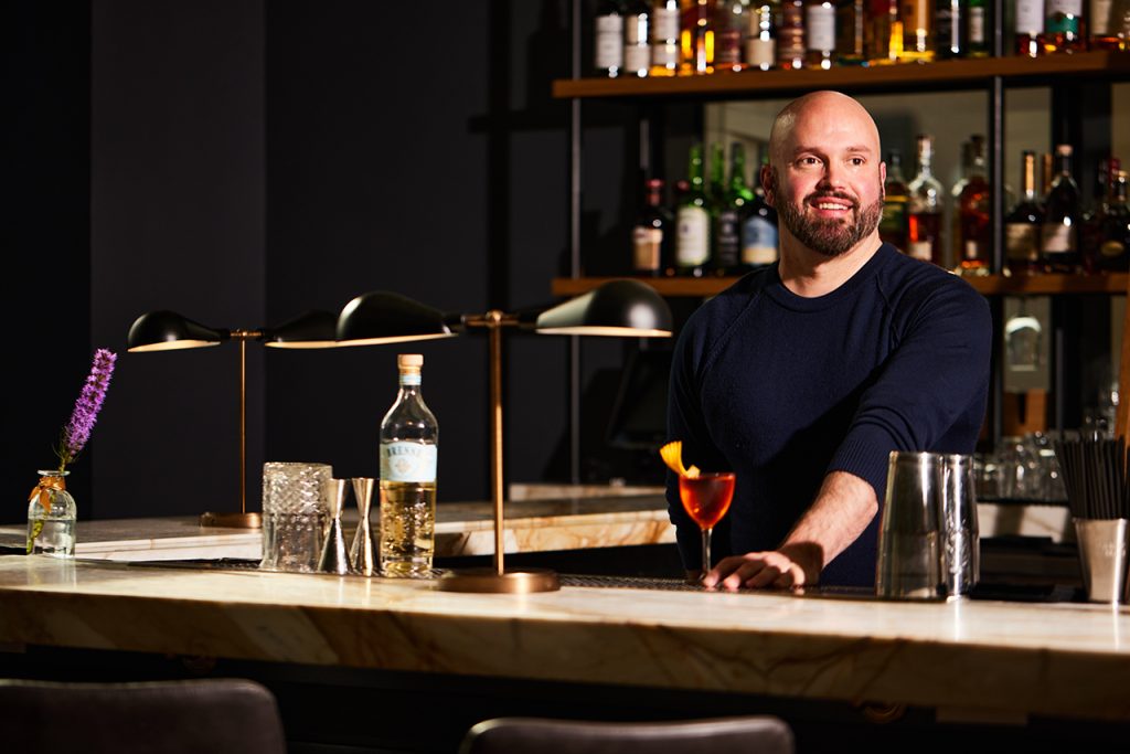 Bartender serving a drink