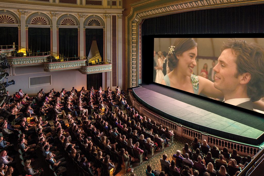 Crowd of people watching a movie