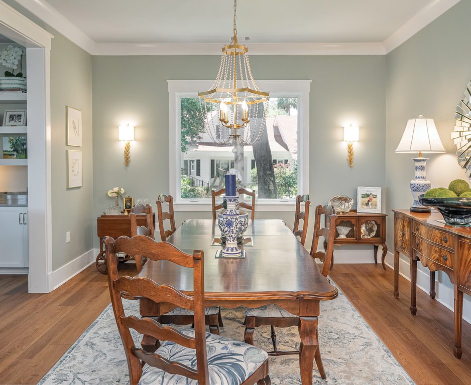 A medium wood dining table and buffet