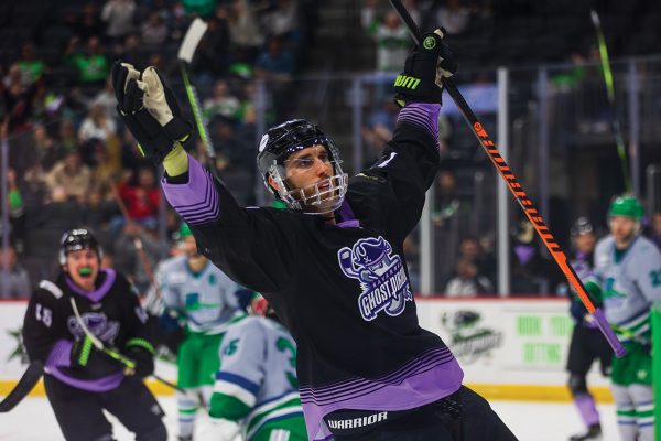 Ghost Pirates hockey player celebrating during a game
