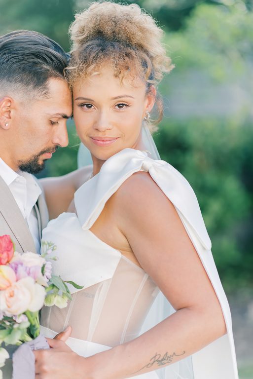 A bride and groom embracing
