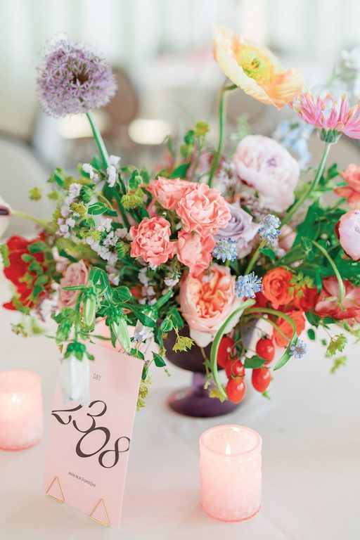 Vase of flowers and a small candle