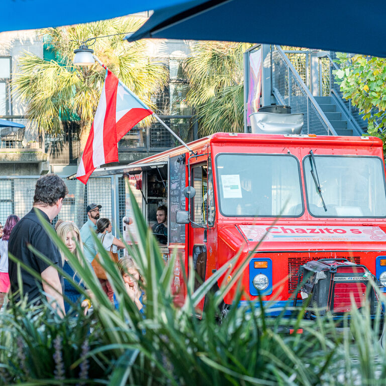 People ordering from a food truck