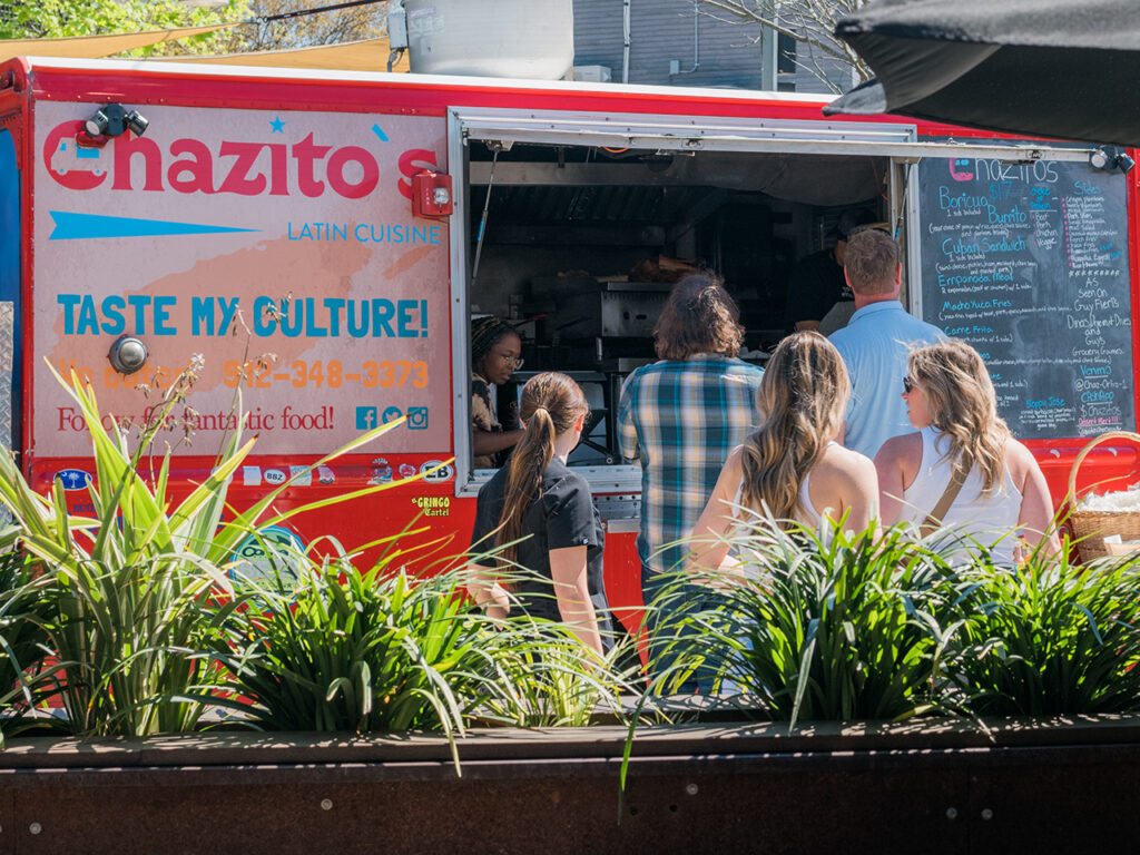 People ordering from a food truck