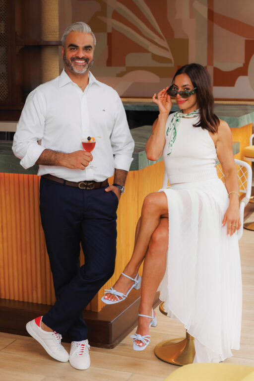 A man and a woman sitting at a bar