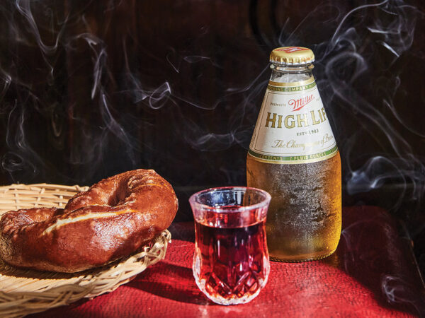 A Miller High Life and a soft pretzel
