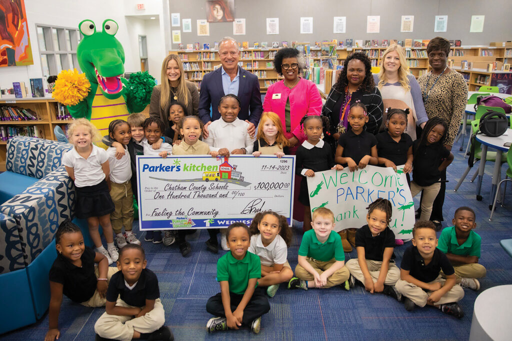 Giving Back: Savannah businessman Greg Parker and Savannah Chatham County Public School System elementary school students and teachers