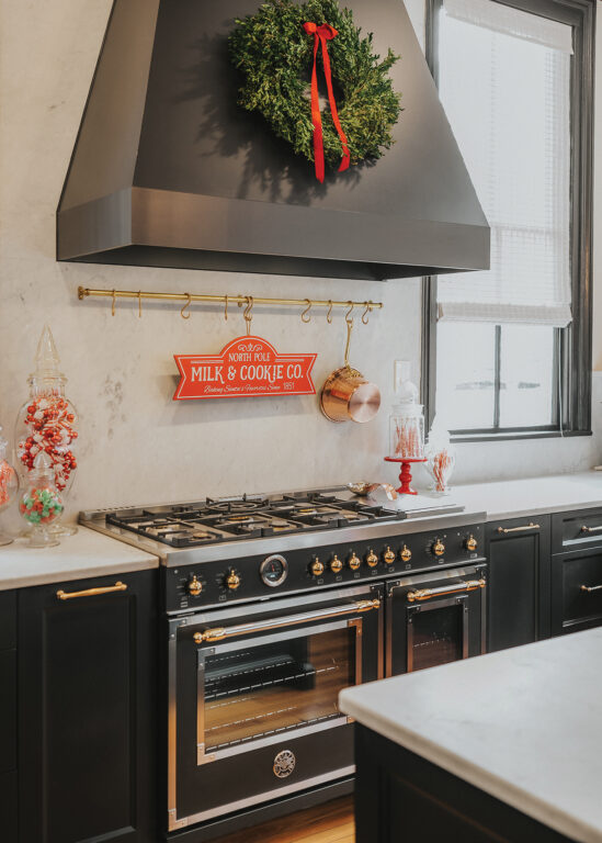 Black and white kitchen in a Victorian home decorated for the holidays