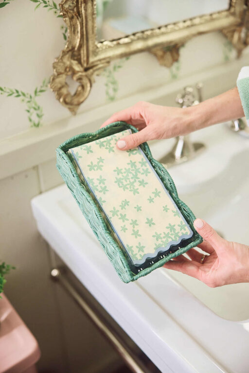 Basket of linen-like paper guest towels for the bathroom