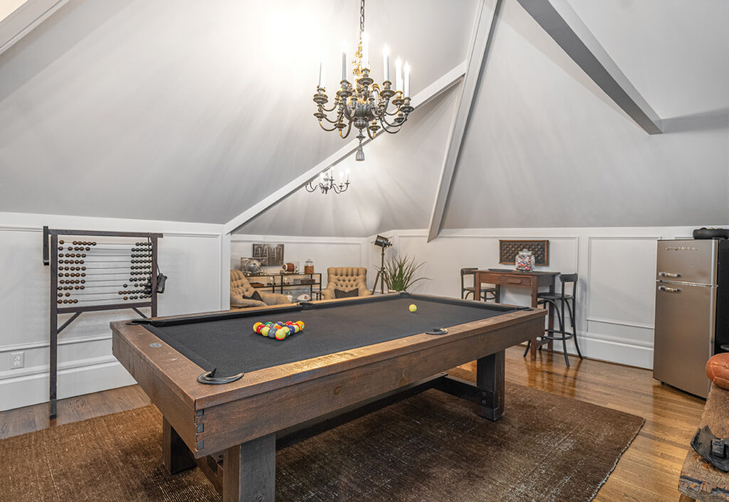 Black felt covered pool table