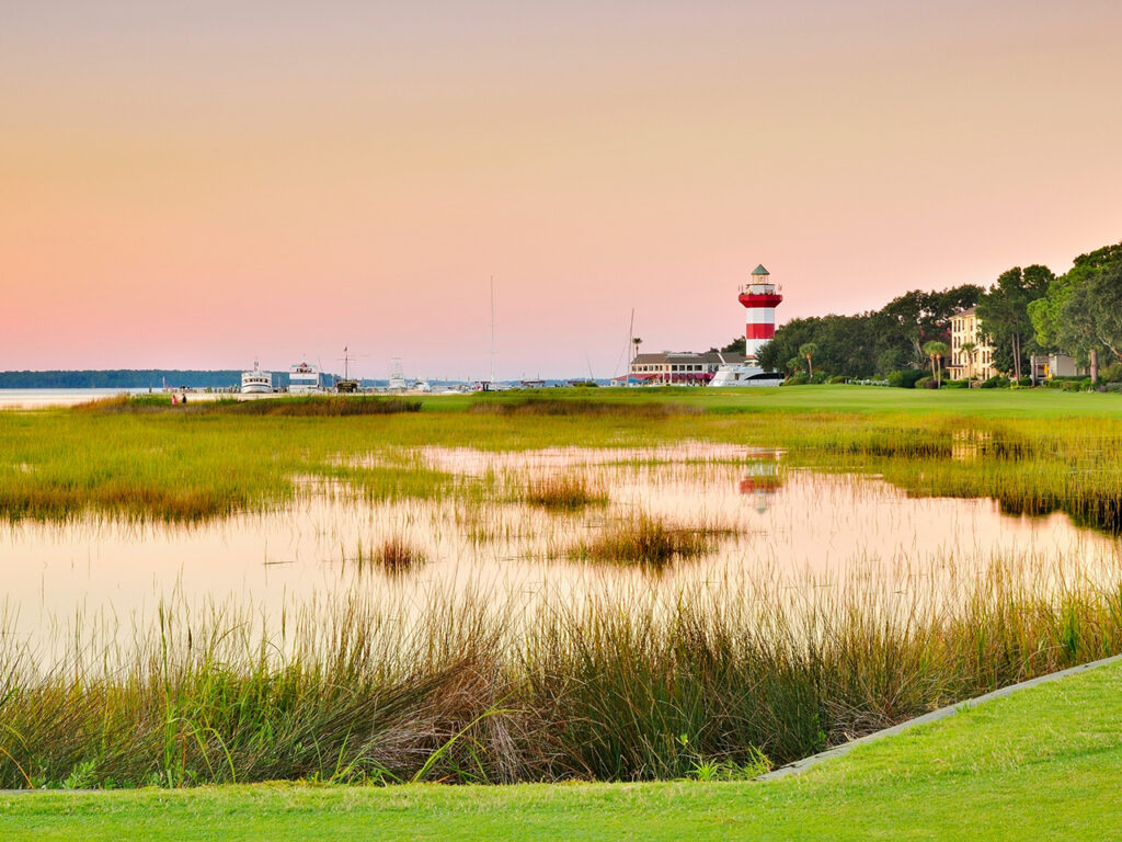 Sunset view of the 18th hole at Harbour Town Golf Course on Hilton Head Island looking towards their famous lighthouse