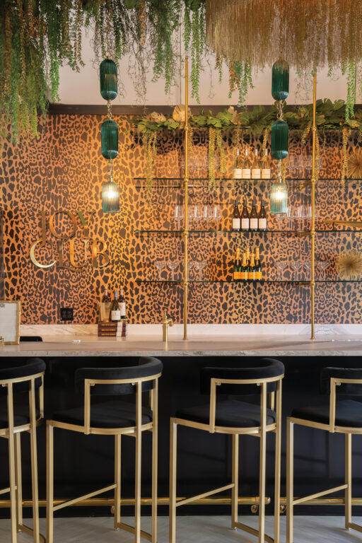 bar back with a cheetah print wallpaper