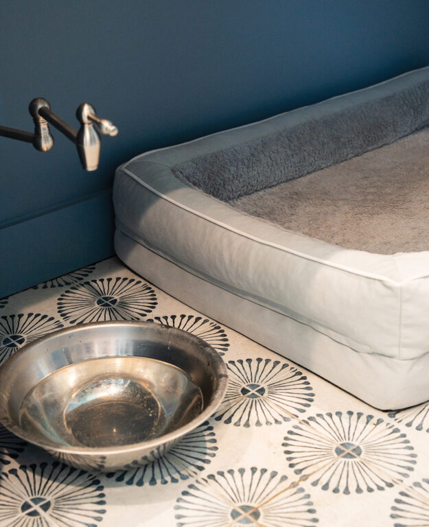Tile floor with blue flower pattern