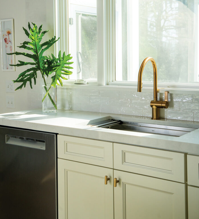 Brass colored kitchen faucet