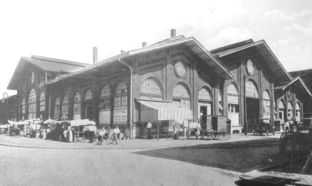 Historical photo of Savannah's old City Market from the 1900s