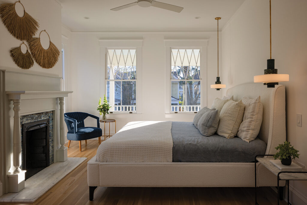 Primary bedroom with a fireplace