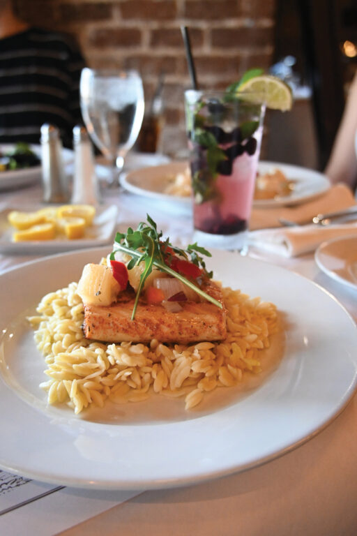 fish filet on a bed of rice