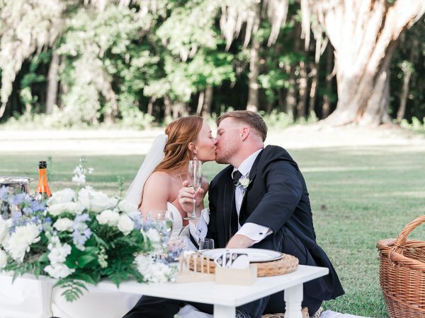 A bride and groom kissing