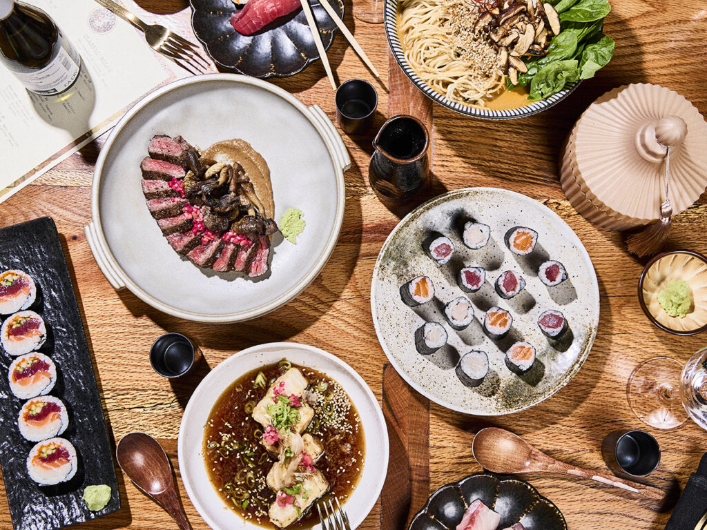 Table full of Japanese foods