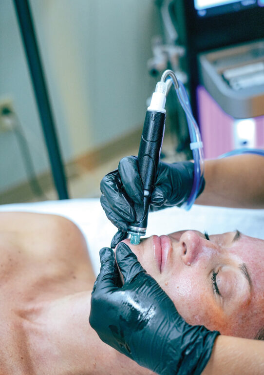A woman getting a Hydrafacial