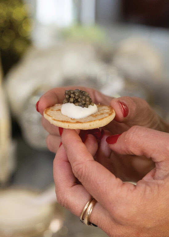 closeup of a cracker with caviar on it