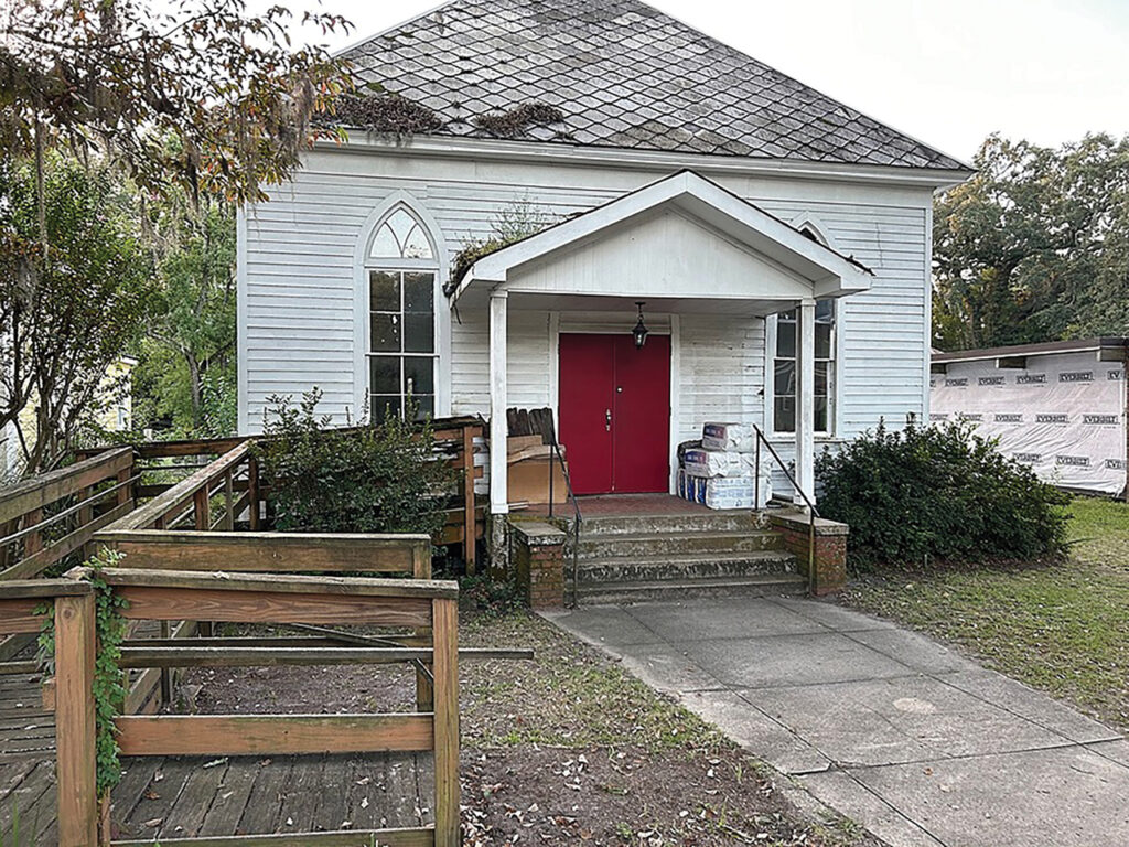 Dilapidated exterior of a former church before it was enovated into a home