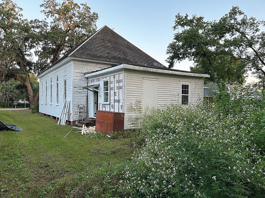 Dilapidated exterior of a former church before it was renovated into a home