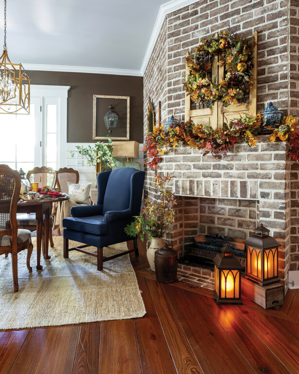 A living room with hardwood floors and a fireplace