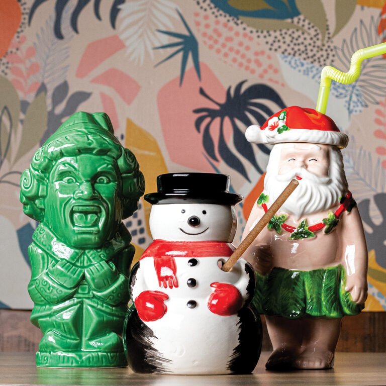 ceramic mugs shaped like a snowman and santa