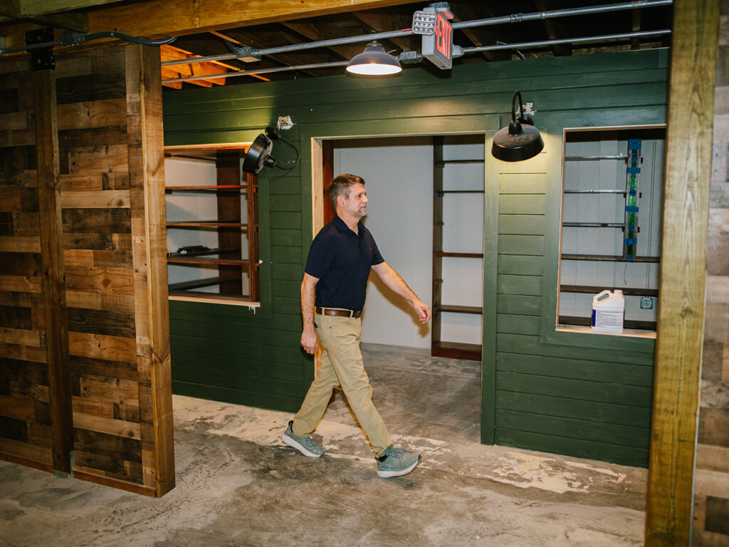 man walking inside a warehouse