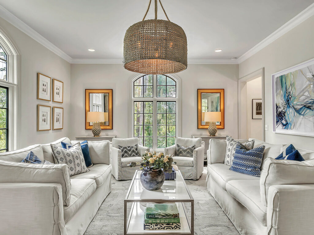 Living room with neutral walls, rug, and furniture