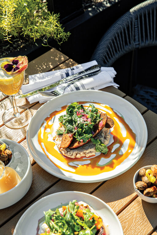 Various food and drinks on a dining table