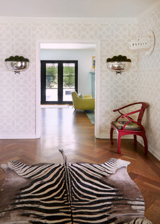 A zebra print rug in the home's entryway
