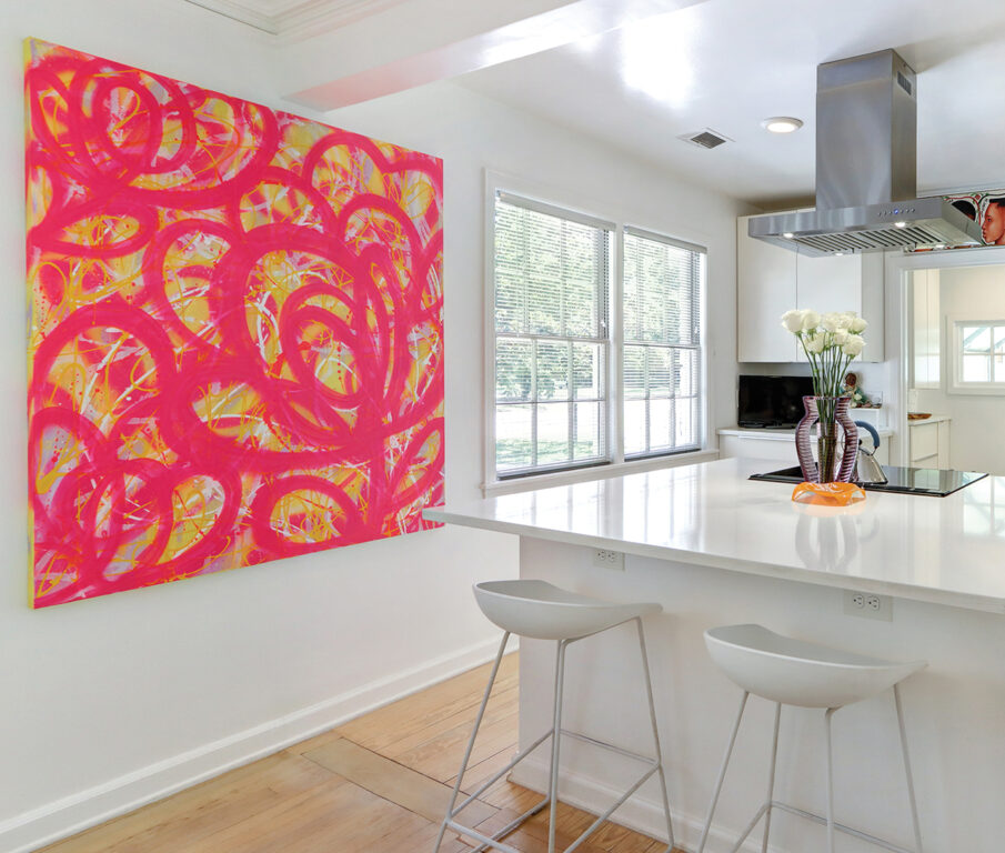 Painting by Jimmy Butcher hanging in a kitchen