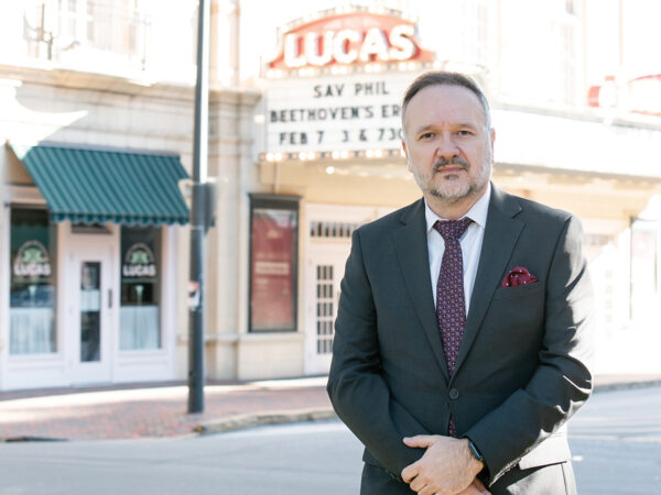 Sinisa Ciric stands in front of the Lucas marquee