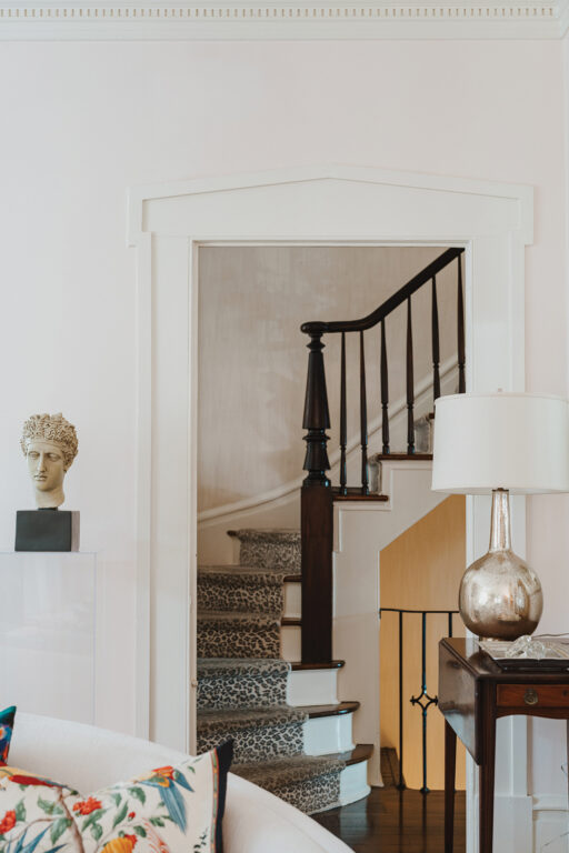 The original banister and stairs with a high-performance fabric stair runner