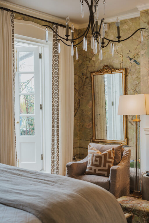 The primary bedroom with soothing green hues