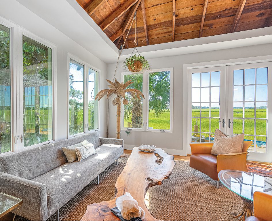 Living room with views of the marsh on all sides
