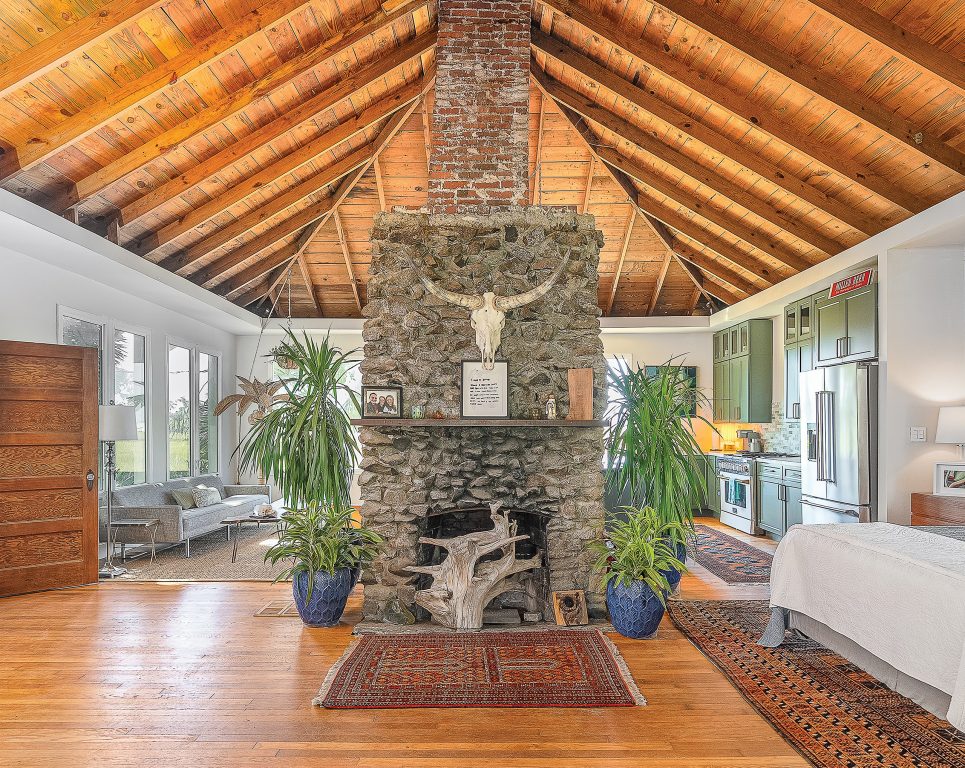 Fireplace at the center of the open-concept main living area