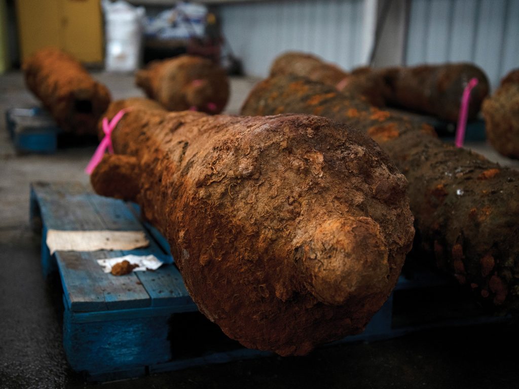 old cannons covered in rust and slime